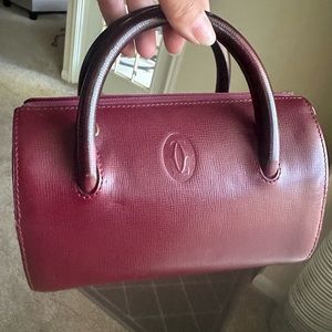 Cartier Paris-mini Bordeaux leather handbag.